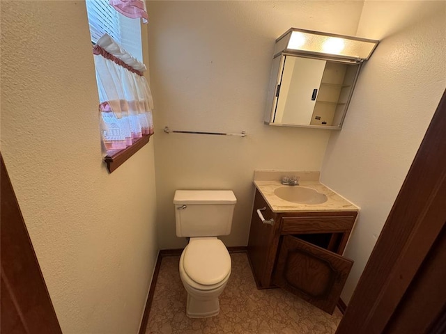 1217 Dove Hollow Dr, Tecumseh, OK 74873 - half bathroom featuring toilet and vanity