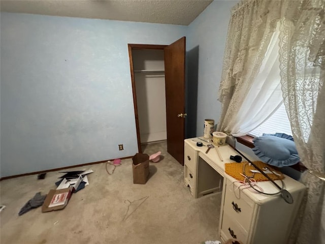 1217 Dove Hollow Dr, Tecumseh, OK 74873 - bedroom featuring light colored carpet and a textured ceiling