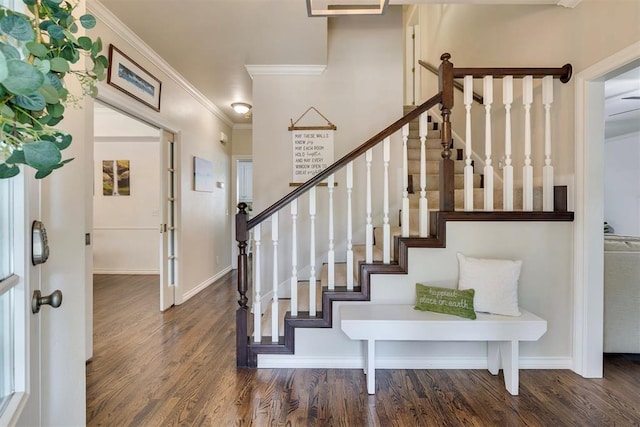 4201 Echohollow Trl, Edmond, OK 73025 - foyer entrance with wood finished floors, crown molding, and stairs