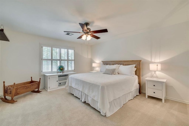 4201 Echohollow Trl, Edmond, OK 73025 - bedroom with light colored carpet and ceiling fan