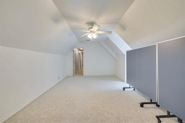 4201 Echohollow Trl, Edmond, OK 73025 - additional living space featuring light carpet, vaulted ceiling, and a ceiling fan