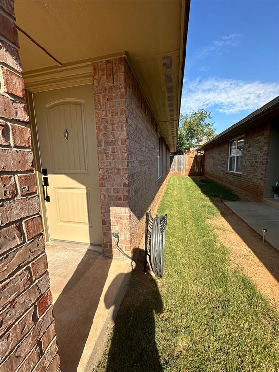 3600 Green Apple Pl, Moore, OK 73160 - entrance to property featuring brick siding