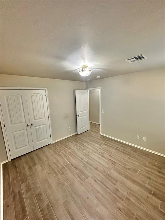 3600 Green Apple Pl, Moore, OK 73160 - unfurnished room featuring wood finished floors and baseboards