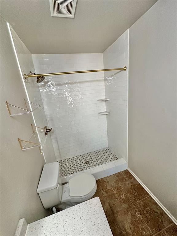 3600 Green Apple Pl, Moore, OK 73160 - bathroom with a tile shower and tile patterned floors