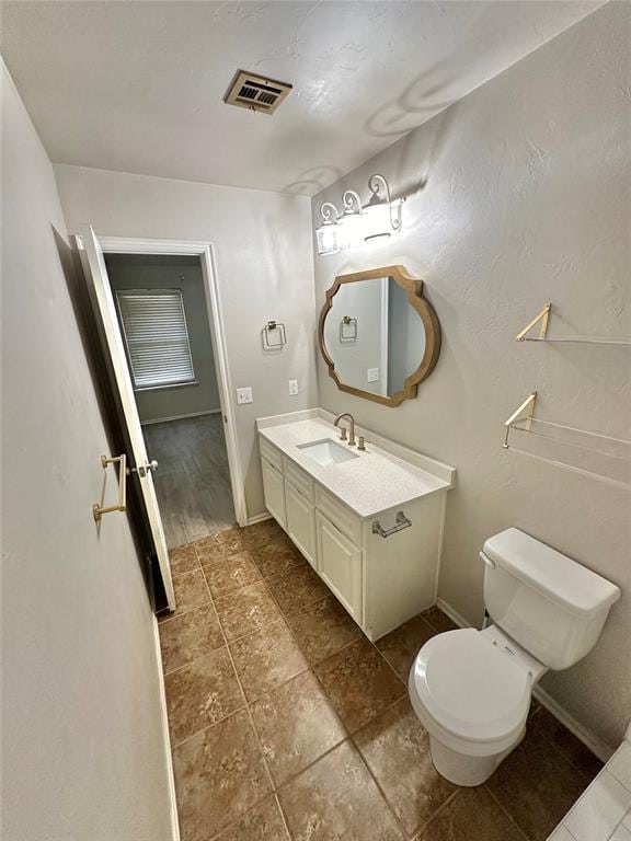 3600 Green Apple Pl, Moore, OK 73160 - half bath featuring vanity and toilet