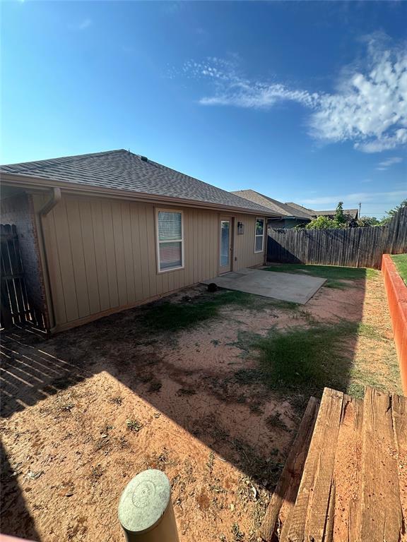 3600 Green Apple Pl, Moore, OK 73160 - rear view of property featuring a patio and a shingled roof