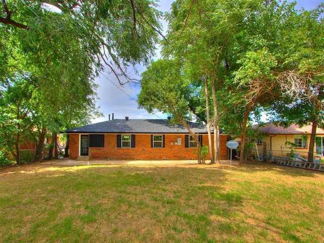 1420 SW 67th St, Oklahoma City, OK 73159 - back of property featuring brick siding