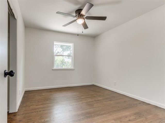 1420 SW 67th St, Oklahoma City, OK 73159 - spare room featuring wood finished floors and ceiling fan