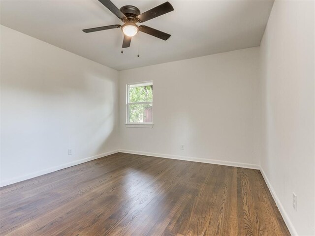 1420 SW 67th St, Oklahoma City, OK 73159 - empty room with dark wood-style flooring and ceiling fan