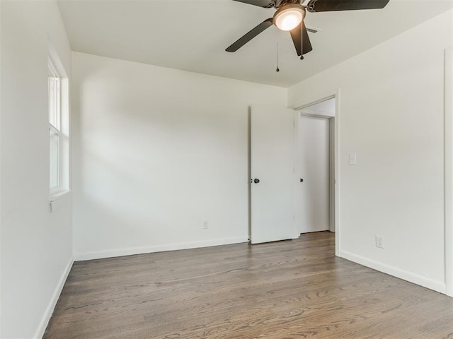 1420 SW 67th St, Oklahoma City, OK 73159 - unfurnished room with a ceiling fan and wood finished floors