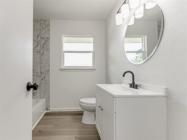 1420 SW 67th St, Oklahoma City, OK 73159 - bathroom with vanity, wood finished floors, and  shower combination