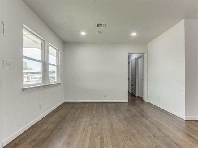 1420 SW 67th St, Oklahoma City, OK 73159 - empty room with wood finished floors and recessed lighting