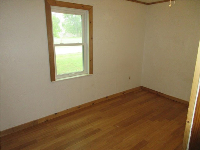 404 S 6th St, Tecumseh, OK 74873 - unfurnished room with light wood finished floors and baseboards