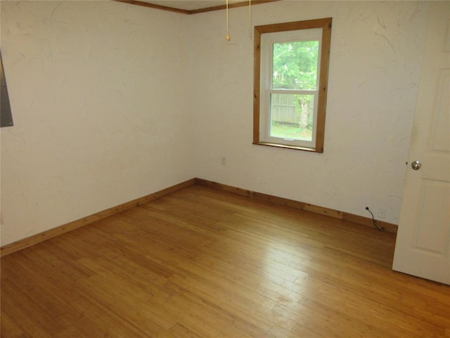 404 S 6th St, Tecumseh, OK 74873 - empty room featuring light wood finished floors and baseboards