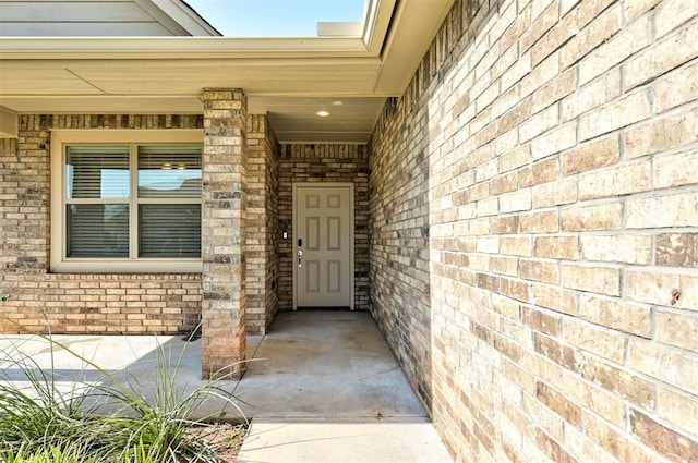 15728 Egerton Pl, Edmond, OK 73013 - property entrance with brick siding and covered porch
