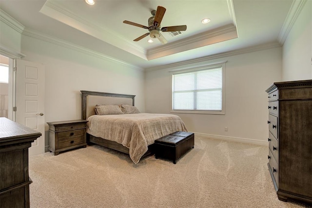 15728 Egerton Pl, Edmond, OK 73013 - bedroom with a tray ceiling, crown molding, light colored carpet, a ceiling fan, and recessed lighting