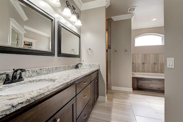 15728 Egerton Pl, Edmond, OK 73013 - full bathroom featuring ornamental molding, a garden tub, double vanity, and tile patterned floors