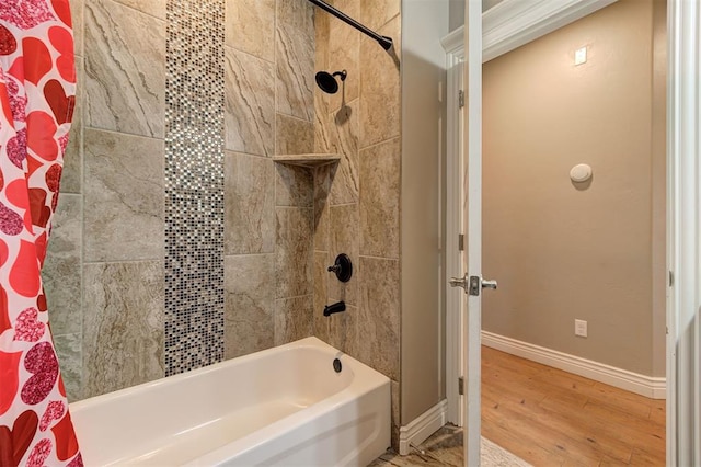 15728 Egerton Pl, Edmond, OK 73013 - full bathroom featuring wood finished floors and shower / bathtub combination with curtain