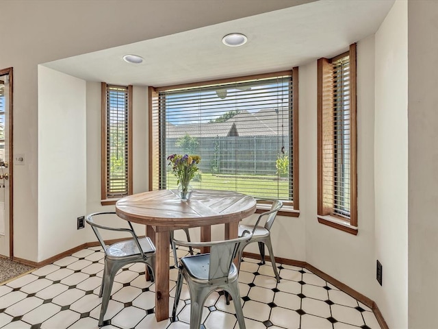 18317 Chestnut Oak Dr, Edmond, OK 73012 - dining area with light floors and baseboards