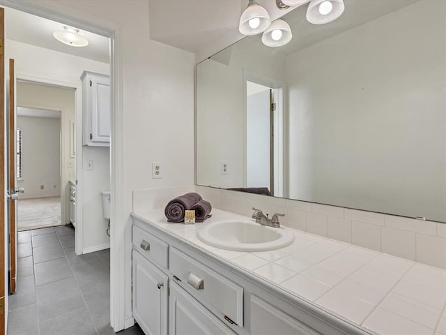 18317 Chestnut Oak Dr, Edmond, OK 73012 - bathroom with vanity and tile patterned flooring