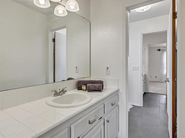 18317 Chestnut Oak Dr, Edmond, OK 73012 - bathroom featuring vanity and tile patterned flooring