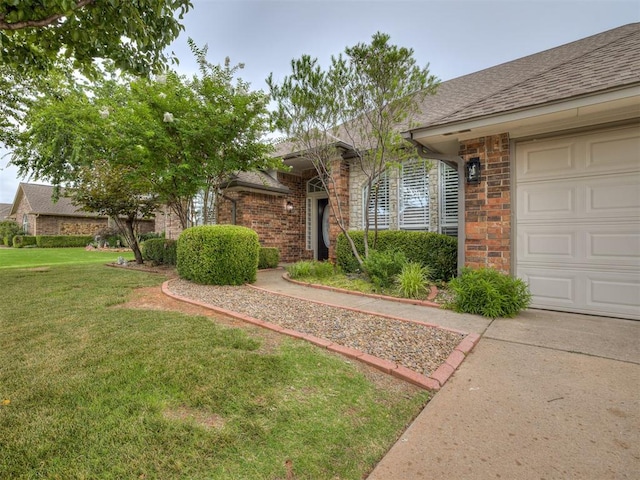 1340 NW 168th St, Edmond, OK 73012 - view of front facade with a shingled roof, a front lawn, and brick siding