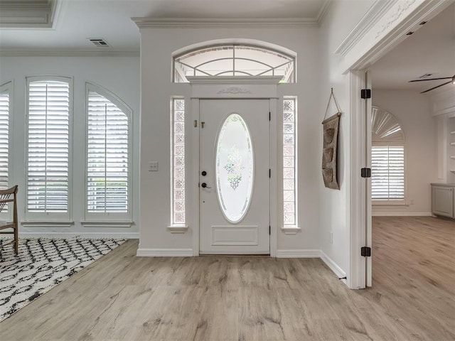 1340 NW 168th St, Edmond, OK 73012 - foyer entrance featuring wood finished floors and ornamental molding