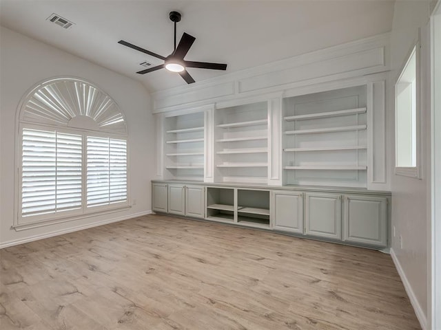 1340 NW 168th St, Edmond, OK 73012 - unfurnished office featuring a ceiling fan, vaulted ceiling, light wood-type flooring, and built in shelves
