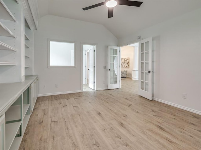 1340 NW 168th St, Edmond, OK 73012 - unfurnished living room with french doors, vaulted ceiling, light wood-type flooring, and ceiling fan