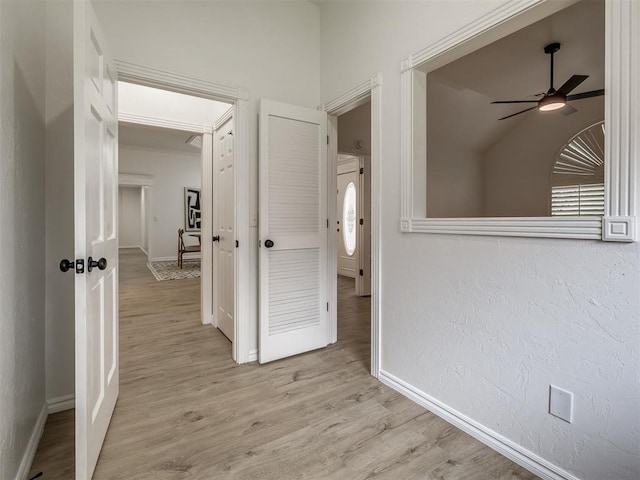 1340 NW 168th St, Edmond, OK 73012 - hallway with light wood-style flooring and baseboards