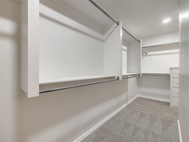 1340 NW 168th St, Edmond, OK 73012 - walk in closet featuring carpet flooring