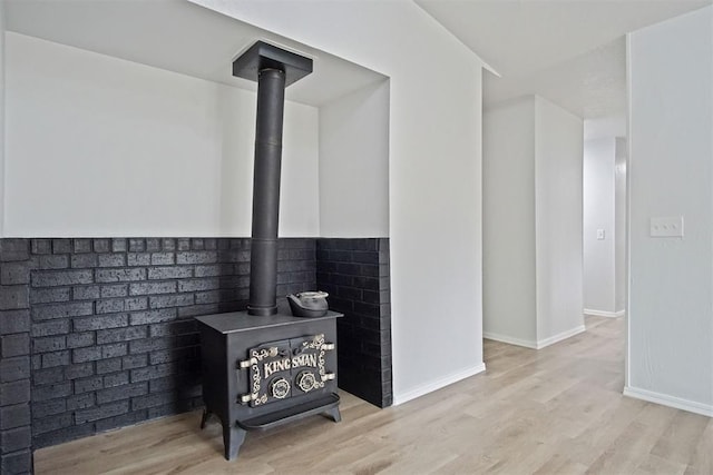 3300 Outpost Cir, Norman, OK 73072 - detailed view of a wood stove and wood finished floors