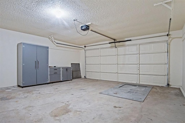 3300 Outpost Cir, Norman, OK 73072 - garage featuring a garage door opener