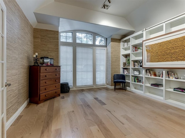 123 E Lakeview Trl, Edmond, OK 73003 - sitting room with light wood-style flooring and vaulted ceiling