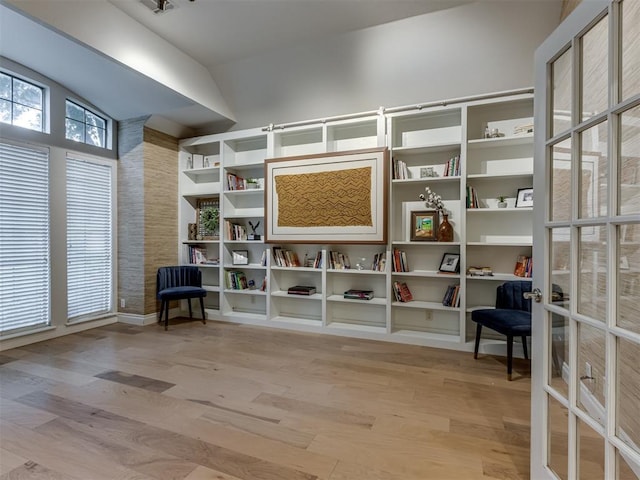 123 E Lakeview Trl, Edmond, OK 73003 - sitting room with wood finished floors and lofted ceiling