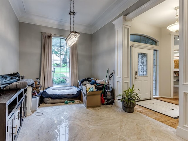 123 E Lakeview Trl, Edmond, OK 73003 - foyer entrance with crown molding and ornate columns