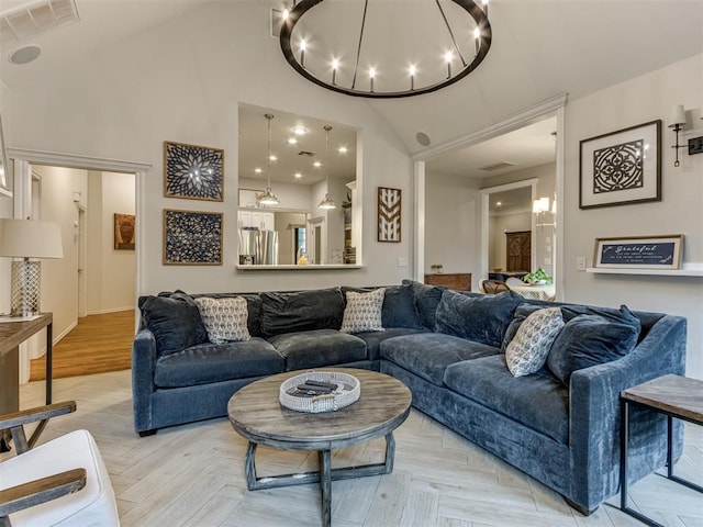 123 E Lakeview Trl, Edmond, OK 73003 - living room with high vaulted ceiling and a chandelier