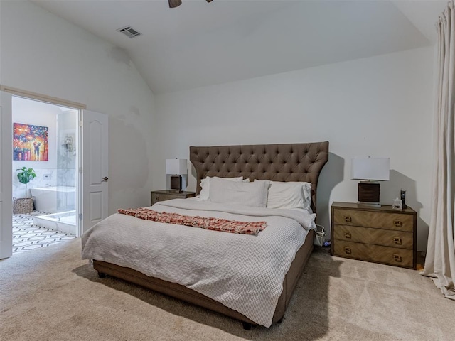 123 E Lakeview Trl, Edmond, OK 73003 - bedroom with carpet floors, lofted ceiling, and ensuite bath