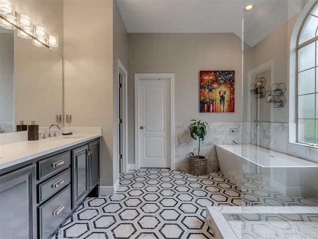 123 E Lakeview Trl, Edmond, OK 73003 - full bathroom featuring a freestanding bath, vanity, recessed lighting, and lofted ceiling