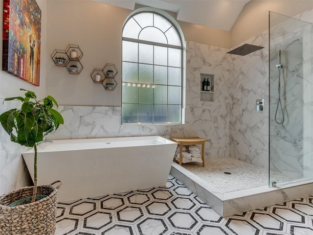 123 E Lakeview Trl, Edmond, OK 73003 - full bath featuring tile walls, a freestanding tub, a marble finish shower, vaulted ceiling, and tile patterned floors