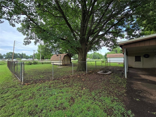 730 N Santa Fe St Unit 4052073333, Pauls Valley, OK 73075 - view of yard with a storage unit