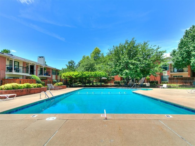 4400 Hemingway Dr Unit 221, Oklahoma City, OK 73118 - community pool featuring a patio area