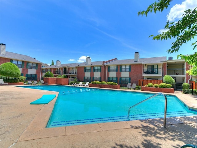 4400 Hemingway Dr Unit 221, Oklahoma City, OK 73118 - community pool with a patio