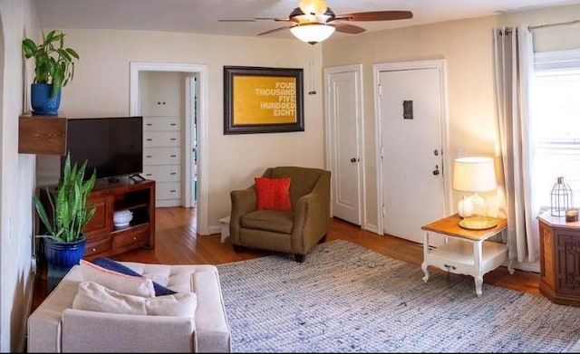 4508 N College Ave, Bethany, OK 73008 - living area with a ceiling fan and wood finished floors