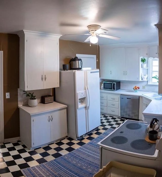 4508 N College Ave, Bethany, OK 73008 - kitchen with appliances with stainless steel finishes, light floors, a ceiling fan, and light countertops