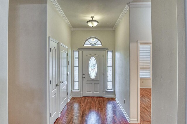 3900 Irvine Dr, Norman, OK 73072 - entrance foyer with wood finished floors, crown molding, and a textured wall