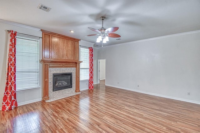 3900 Irvine Dr, Norman, OK 73072 - unfurnished living room with a ceiling fan, light wood finished floors, a high end fireplace, and ornamental molding