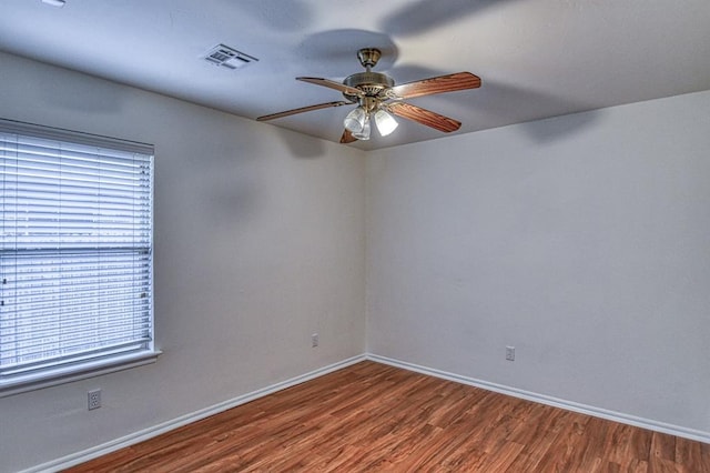 3900 Irvine Dr, Norman, OK 73072 - spare room featuring wood finished floors and a ceiling fan