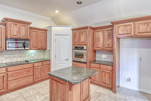 3900 Irvine Dr, Norman, OK 73072 - kitchen with appliances with stainless steel finishes, a kitchen island, decorative backsplash, ornamental molding, and brown cabinetry