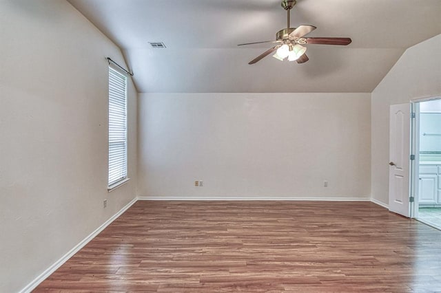 3900 Irvine Dr, Norman, OK 73072 - additional living space with ceiling fan, lofted ceiling, and wood finished floors